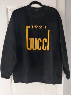 Black Crewneck Sweatshirt with Yellow Logo